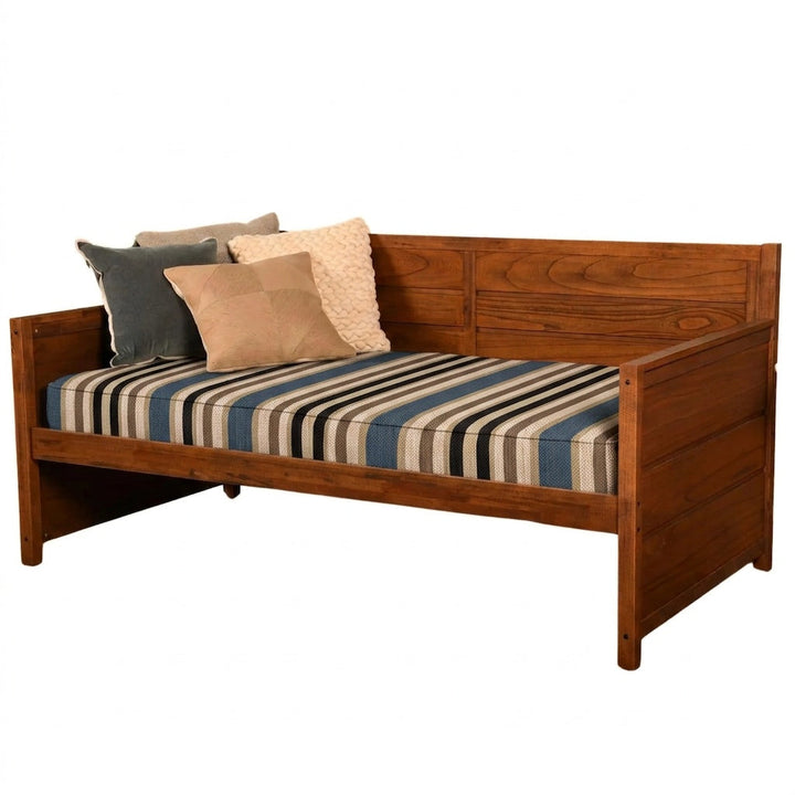 Harbor Stripe Canvas daybed cover shown fitted over a mattress in red and cream stripe
