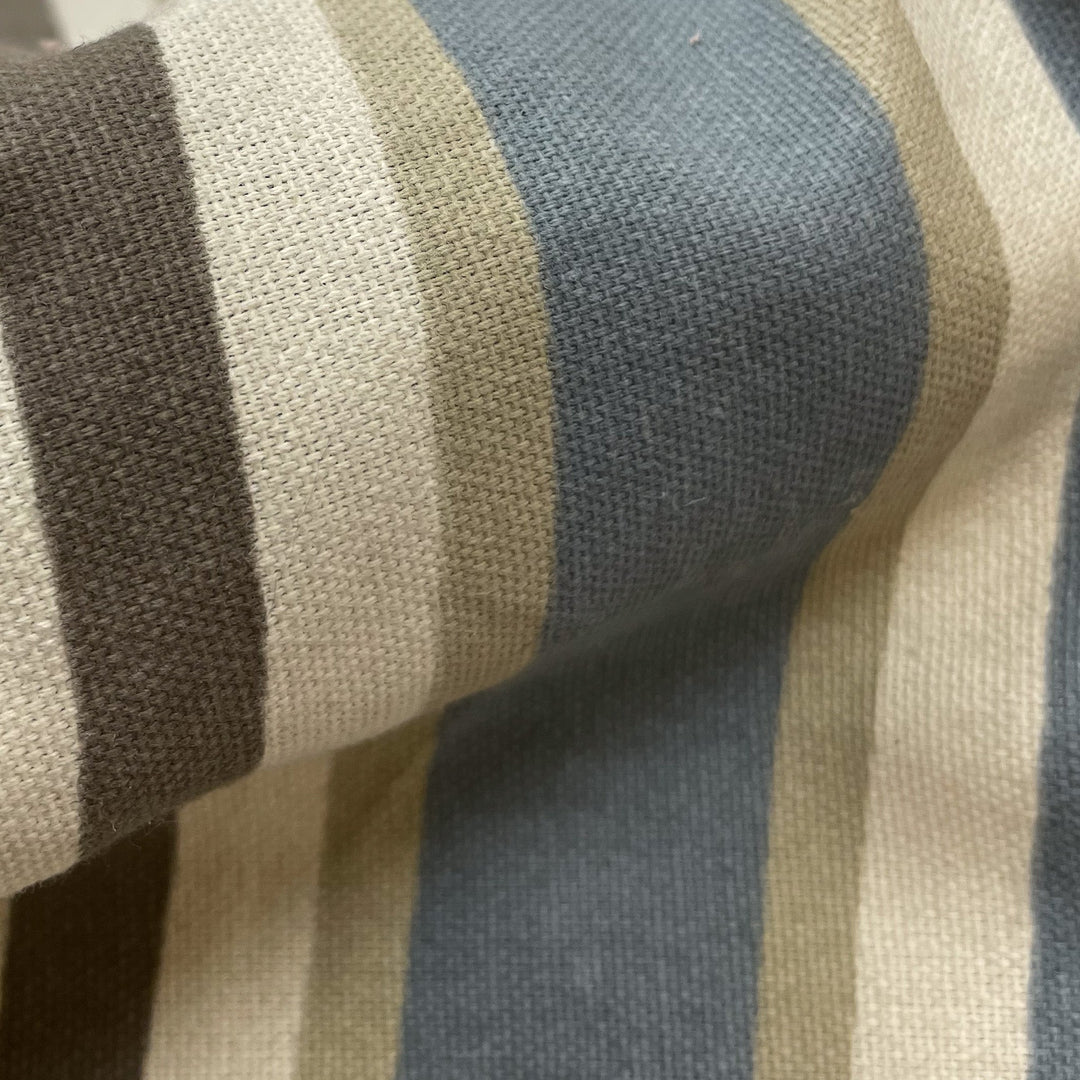 Close-up fabric swatch of Harbor Stripe Canvas, a red and cream stripe printed on lightweight cotton canvas