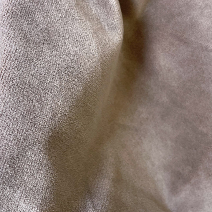 Close-up fabric swatch of Velvet Blush Beige, a soft blush beige velvet with a short, dense pile