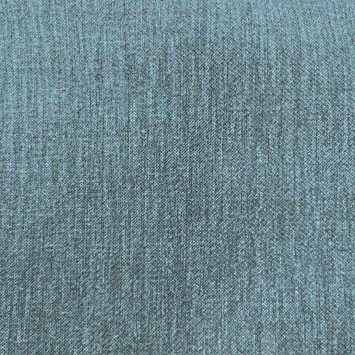 A close-up texture shot of a heathered blue-gray woven fabric, showing the fine knit pattern and subtle color variation.