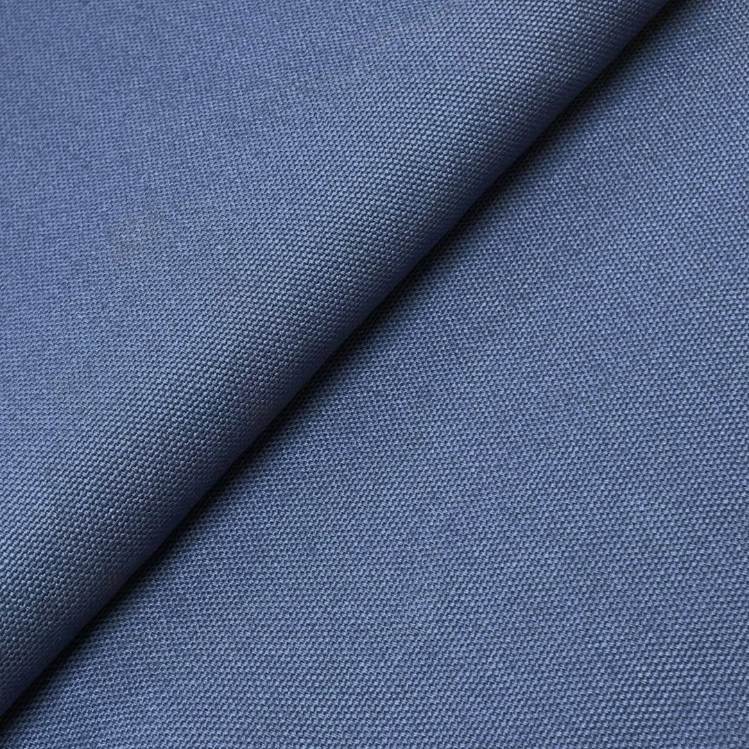 Close-up of navy blue cotton canvas fabric texture