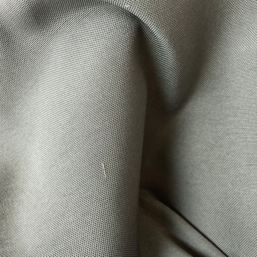 Close-up fabric swatch of Cool Gray Outdoor Performance, a solid cool gray indoor-outdoor performance weave